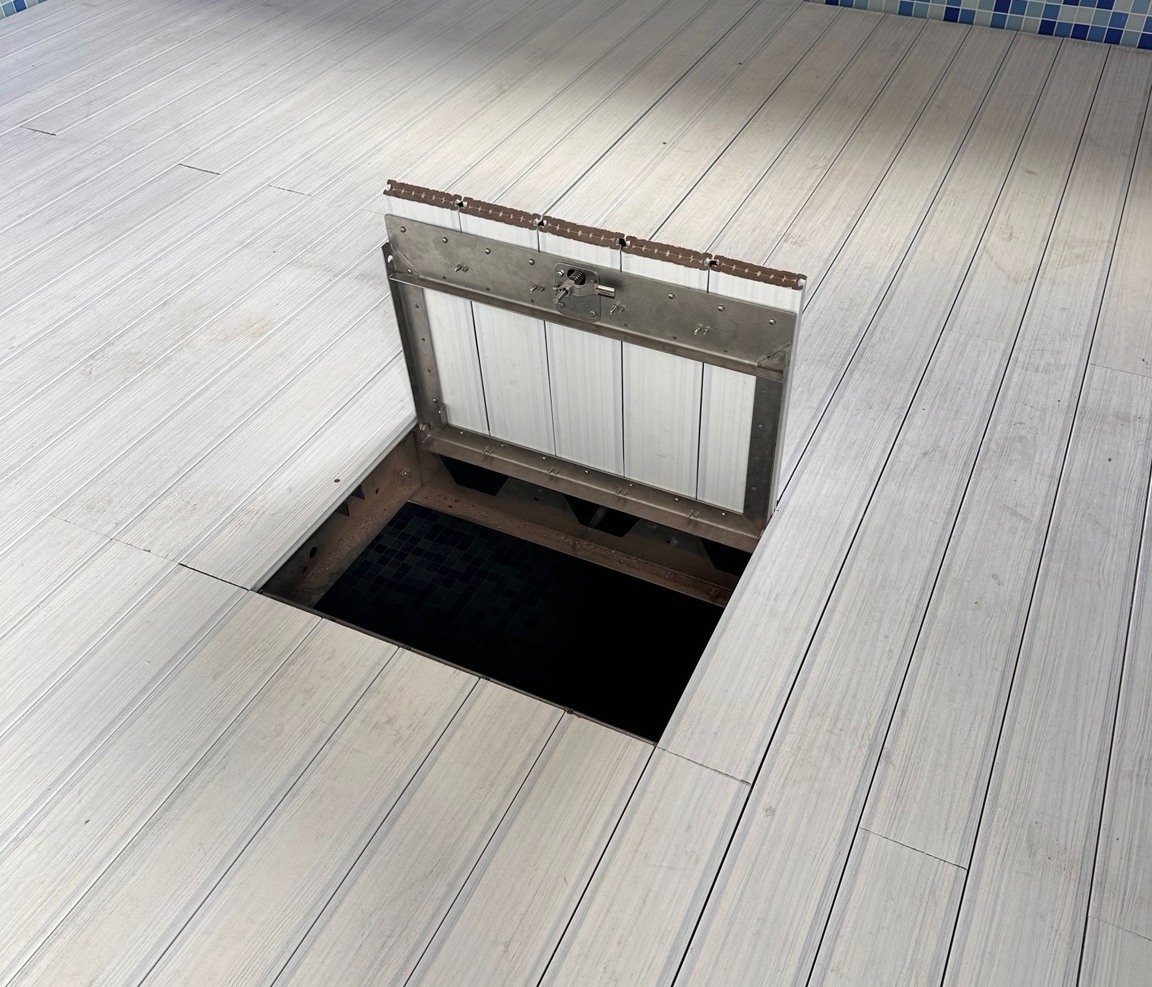 Access hatch and finished surface
